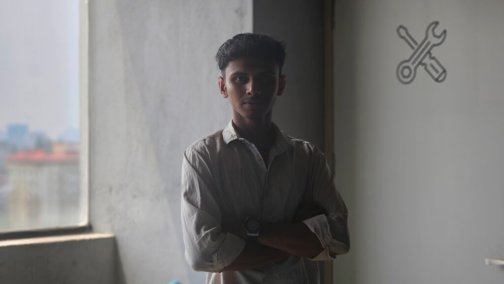 #1 Freelance Digital Marketing Analyst in Mangalore Standing in front of wall and planning digital marketing strategies